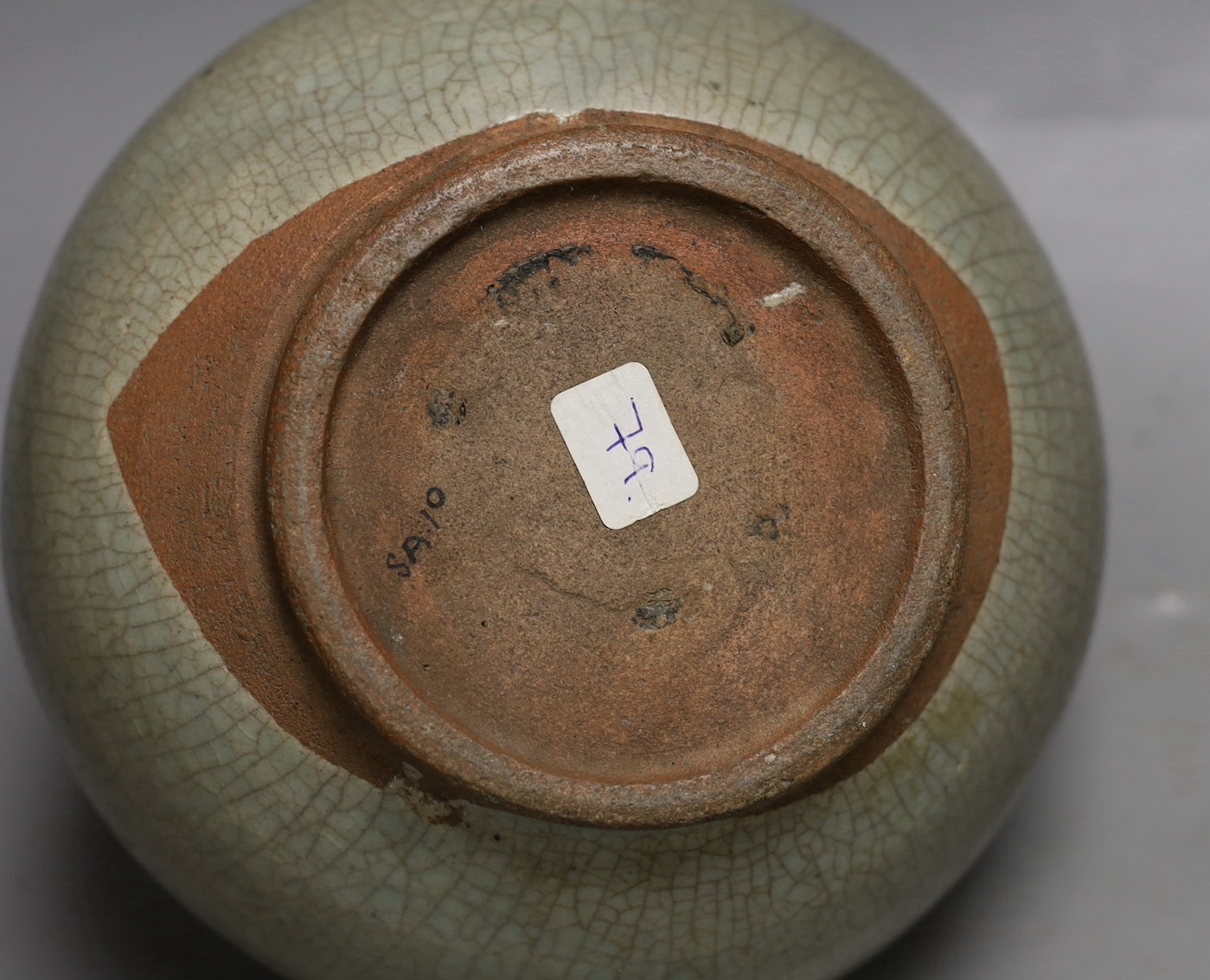 A Thai Sawankhalok green glazed ring handled jar, 15th century
